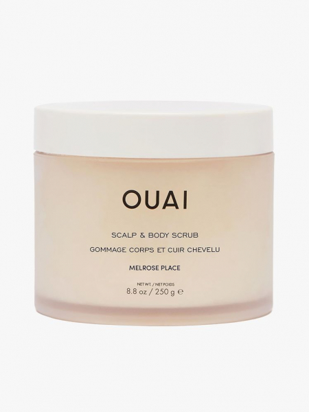 Ouai Scalp & Body Scrub beige jar with white lid on light gray background